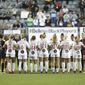 Washington Spirit and NJ/NY Gotham FC players cause a stoppage midway through the first half and gather in unity for U.S. women&#x27;s team players, during an NWSL soccer match Wednesday, Oct. 6, 2021, in Chester, Pa. (Charles Fox/The Philadelphia Inquirer via AP)