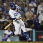 Los Angeles Dodgers&#39; Chris Taylor (3) hits a home run during the ninth inning to win a National League Wild Card playoff baseball game 3-1 over the St. Louis Cardinals Wednesday, Oct. 6, 2021, in Los Angeles. Cody Bellinger also scored. (AP Photo/Marcio Jose Sanchez)