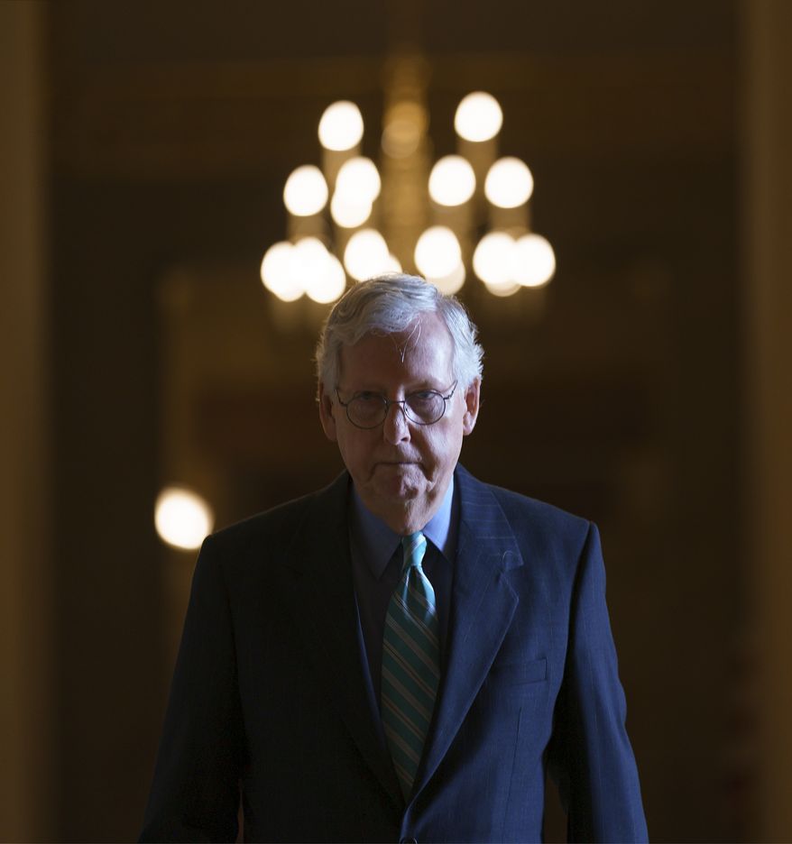 Senate Minority Leader Mitch McConnell, R-Ky., walks to the chamber for a vote, at the Capitol in Washington, Thursday, Oct. 7, 2021. Senate leaders announced an agreement to extend the government&#39;s borrowing authority into December, temporarily averting an unprecedented default that experts say would have decimated the economy. (AP Photo/J. Scott Applewhite)