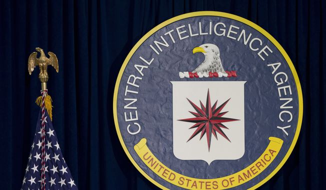 This April 13, 2016, file photo shows the seal of the Central Intelligence Agency at CIA headquarters in Langley, Va. The CIA says it will create a top-level working group on China as part of a broad U.S. government effort focused on countering Beijing&#x27;s influence. (AP Photo/Carolyn Kaster, File)