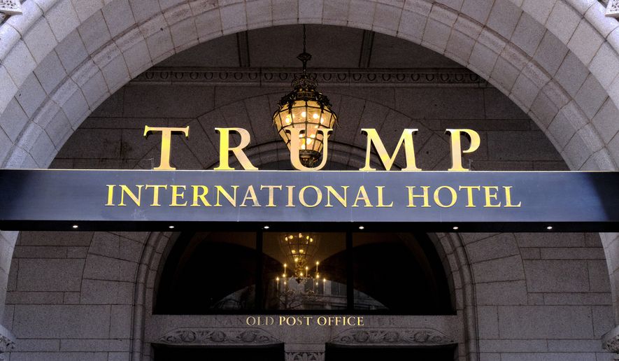 FILE - This March 11, 2019 file photo, shows the north entrance of the Trump International in Washington.  Former President Donald Trump&#39;s company lost more than $70 million operating his Washington D.C. hotel while in office, forcing him at one point get a reprieve from a major bank on payments on a loan, according to documents released Friday, Oct. 8, 2021, by a House committee investigating his business. (AP Photo/Mark Tenally, File)