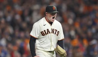 San Francisco Giants pitcher Logan Webb reacts after striking out Los Angeles Dodgers&#39; Trea Turner during the sixth inning of Game 1 of a baseball National League Division Series Friday, Oct. 8, 2021, in San Francisco. (AP Photo/John Hefti) **FILE**