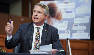 FILE - In this Sept. 20, 2021, file photo, Sen. Roger Marshall, R-Kan., speaks during a Senate Health, Education, Labor, and Pensions Committee hearing to discuss reopening schools during the COVID-19 pandemic on Capitol Hill in Washington. Marshall won&#39;t let people forget he&#39;s a doctor by putting &amp;quot;Doc&amp;quot; in the letterhead of his U.S. Senate office news releases. But when it comes to COVID-19 vaccines, other doctors think he sounds far less like a doctor and far more like a politician rallying hard-right supporters. (Greg Nash/Pool via AP, File)