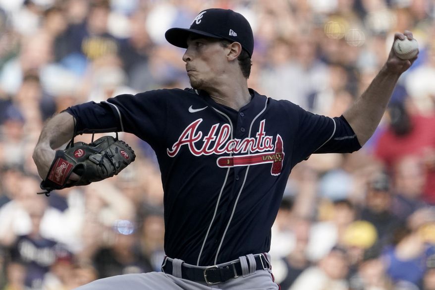 Atlanta Braves starting pitcher Max Fried throws against the Milwaukee Brewers during the first inning in Game 2 of baseball&#39;s National League Divisional Series Saturday, Oct. 9, 2021, in Milwaukee. (AP Photo/Morry Gash)