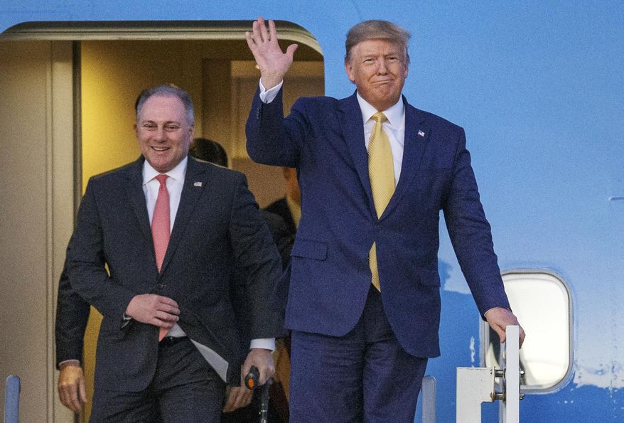 In this Friday, Oct. 11, 2019, file photo, President Donald Trump and House Minority Whip Steve Scalise, R-La., arrive in Lake Charles, La. In a television interview aired Sunday, Oct. 10, 2021, Scalise, the House’s second-ranking Republican, stood by Trump’s lie that Democrat Joe Biden won the White House because of mass voter fraud. (AP Photo/Brett Duke, File)