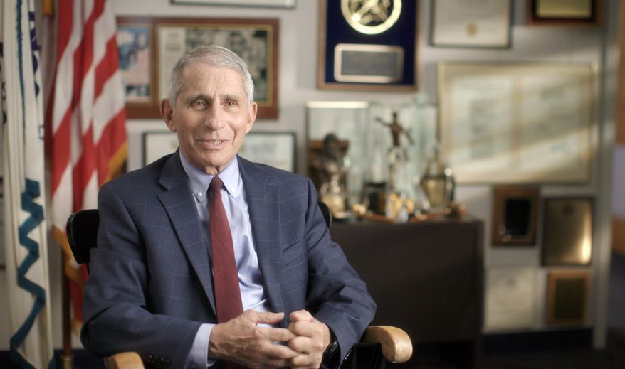 This image released by National Geographic shows Dr. Anthony Fauci at the NIH in Bethesda, Md., during the filming of the documentary "Fauci."  (Visko HatfNational Geographic via AP)