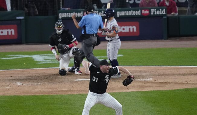 Chicago White Sox relief pitcher Liam Hendriks reacts to the final out against the Houston Astros in the ninth inning during Game 3 of a baseball American League Division Series Sunday, Oct. 10, 2021, in Chicago. (AP Photo/Charles Rex Arbogast) **FILE**