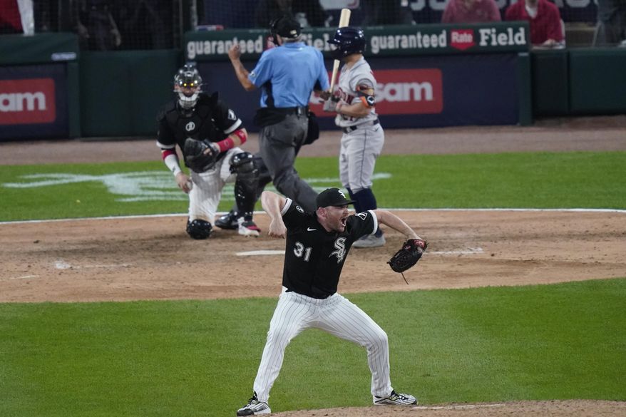 Chicago White Sox relief pitcher Liam Hendriks reacts to the final out against the Houston Astros in the ninth inning during Game 3 of a baseball American League Division Series Sunday, Oct. 10, 2021, in Chicago. (AP Photo/Charles Rex Arbogast) **FILE**