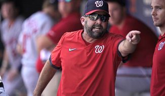 Washington Nationals hitting coach Kevin Long is ejected as he argues with an umpire during the fifth inning of a baseball game against the New York Mets at Citi Field, Thursday, Aug. 12, 2021, in New York. The Mets defeated the Nationals 4-1. (AP Photo/Seth Wenig) **FILE**