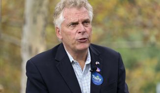 Virginia Democratic gubernatorial candidate and former Gov. Terry McAuliffe, speaks during an interview at County Government Center in Fairfax, Va., Wednesday, Oct. 13, 2021. (AP Photo/Jose Luis Magana)