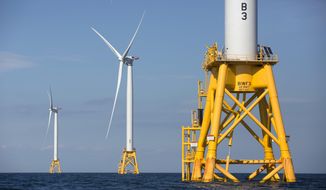 In this Aug. 15, 2016, file photo, three of Deepwater Wind&#x27;s five turbines stand in the water off Block Island, R.I., the nation&#x27;s first offshore wind farm. Interior Secretary Deb Haaland says the Biden administration will hold lease sales for up to seven offshore wind farms on the East and West coasts and in the Gulf of Mexico in the next four years. The projects are part of the administration&#x27;s plan to deploy 30 gigawatts of offshore wind energy by 2030,  generating enough electricity to power more than 10 million homes. (AP Photo/Michael Dwyer, File)
