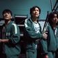 This undated photo released by Netflix shows South Korean cast members, from left, Park Hae-soo, Lee Jung-jae and Jung Ho-yeon in a scene from &amp;quot;Squid Game.&amp;quot; Squid Game, a globally popular South Korea-produced Netflix show that depicts hundreds of financially distressed characters competing in deadly children’s games for a chance to escape severe debt, has struck a raw nerve at home, where there’s growing discontent over soaring household debt, decaying job markets and worsening income inequality. (Youngkyu Park/Netflix via AP) ** FILE **