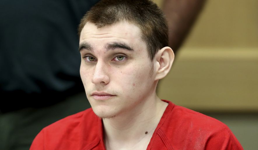 FILE - In this Dec. 10, 2019, file photo, Parkland school shooting defendant Nikolas Cruz appears at a hearing in Fort Lauderdale, Fla. A court hearing is set Friday, Oct. 15, 2021 in Florida for Nikolas Cruz, the man police said has confessed to the 2018 massacre of 17 people at a high school. The hearing in Broward County Circuit Court was scheduled abruptly Thursday and does not describe the purpose.(Amy Beth Bennett/South Florida Sun Sentinel via AP, Pool, File)