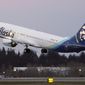 In this Monday, March 1, 2021 file photo, The first Alaska Airlines passenger flight on a Boeing 737-9 Max airplane takes off on a flight to San Diego from Seattle-Tacoma International Airport in Seattle. (AP Photo/Ted S. Warren, File)