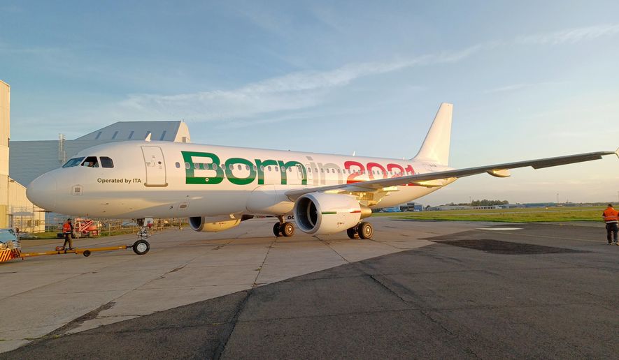 This picture made available by ITA (Italy Air Transportation) on Monday, Oct. 11, 2021, shows one of the company&#x27;s first Airbus A320 that will start flying as of Oct. 15, 2021. Alitalia, long financially ailing, won’t exist anymore since Oct. 14, and its new incarnation, a new company called ITA, will start out with a fleet of 52 aircraft, which will go up to 78 in 2022 with the arrival of new-generation airplanes. The new company being formed says it will only keep some 2,800 of 10,000 of Alitalia’s employees. (ITA via LaPresse/AP)