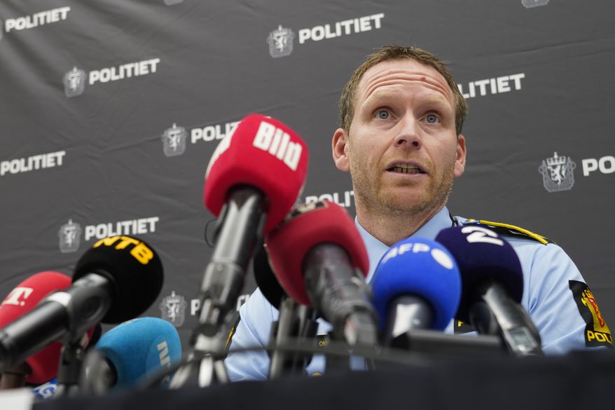 Police Inspector Per Thomas Omholt holds a press conference about the development in the murder case in Kongsberg, Norway, Friday, Oct. 15, 2021. The suspect in a bow-and-arrow attack that killed five people and wounded three in a small Norwegian town is facing a custody hearing Friday. He won’t appear in court because he has confessed to the killings and has agreed to being held in custody. (Terje Bendiksby/NTB via AP)