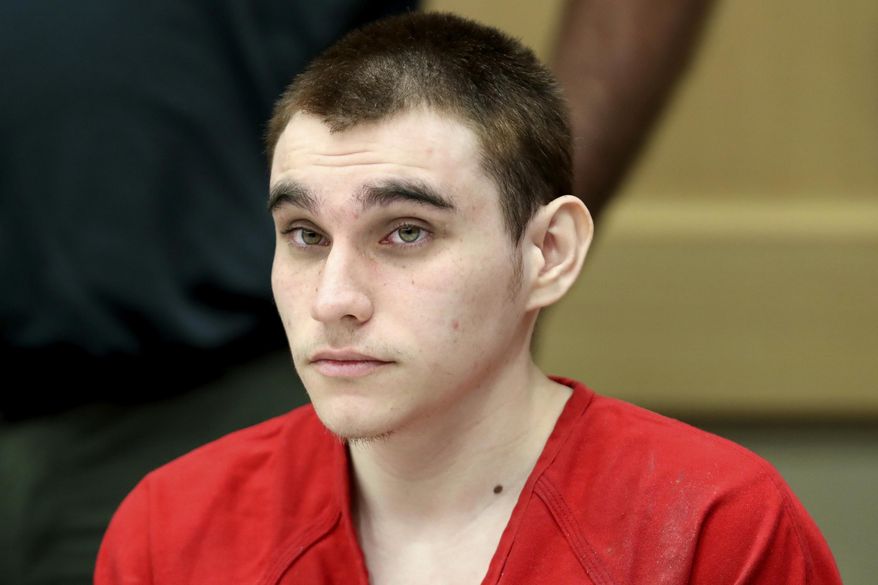 FILE - In this Dec. 10, 2019, file photo, Parkland school shooting defendant Nikolas Cruz appears at a hearing in Fort Lauderdale, Fla. A court hearing is set Friday, Oct. 15, 2021 in Florida for Nikolas Cruz, the man police said has confessed to the 2018 massacre of 17 people at a high school. The hearing in Broward County Circuit Court was scheduled abruptly Thursday and does not describe the purpose.(Amy Beth Bennett/South Florida Sun Sentinel via AP, Pool, File)