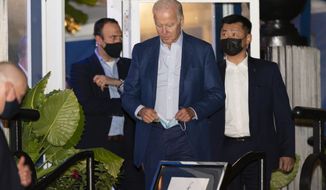 President Joe Biden leaves seafood restaurant Fiola Mare for a date night with first lady Jill Biden in the Georgetown section of Washington, Saturday, Oct. 16, 2021. (AP Photo/Manuel Balce Ceneta)