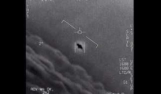 The image from video provided by the Department of Defense shows an unexplained object as it is tracked high in the clouds, traveling against the wind. There&#39;s a whole fleet of them, one naval aviator tells another, though only one indistinct object is shown. It&#39;s rotating.&quot; The U.S. government has been taking a hard look at unidentified flying objects, under orders from Congress, and an official report was released in June 2021. (Department of Defense via AP)