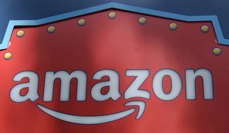 In this Oct. 23, 2018, photo, an Amazon logo is seen atop the Amazon Treasure Truck The Park DTLA office complex in downtown Los Angeles. U.S. House lawmakers held out the threat of seeking a criminal investigation of Amazon, saying they&#39;re giving the tech giant a final chance&quot; to correct previous testimony by executives on its competition practices. The action, coming in a letter Monday, Oct. 18, 2021 to Amazon President and CEO Andy Jassy, marks an escalation in a bipartisan battle against Amazon by the House Judiciary Committee panel that has investigated the market dominance of Big Tech. (AP Photo/Richard Vogel) **FILE**