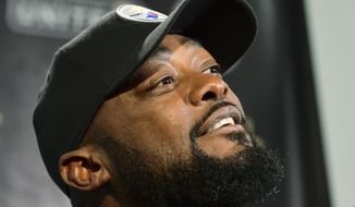 Pittsburgh Steelers head coach Mike Tomlin takes questions at the news conference after an NFL football game against the Seattle Seahawks, Monday, Oct. 18, 2021, in Pittsburgh. The Steelers won 23-20 in overtime. (AP Photo/Fred Vuich) **FILE**