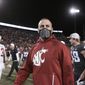 Washington State coach Nick Rolovich walks on the field after the team&#39;s NCAA college football game against Stanford, Saturday, Oct. 16, 2021, in Pullman, Wash. Washington State won 34-31. (AP Photo/Young Kwak) **FILE**