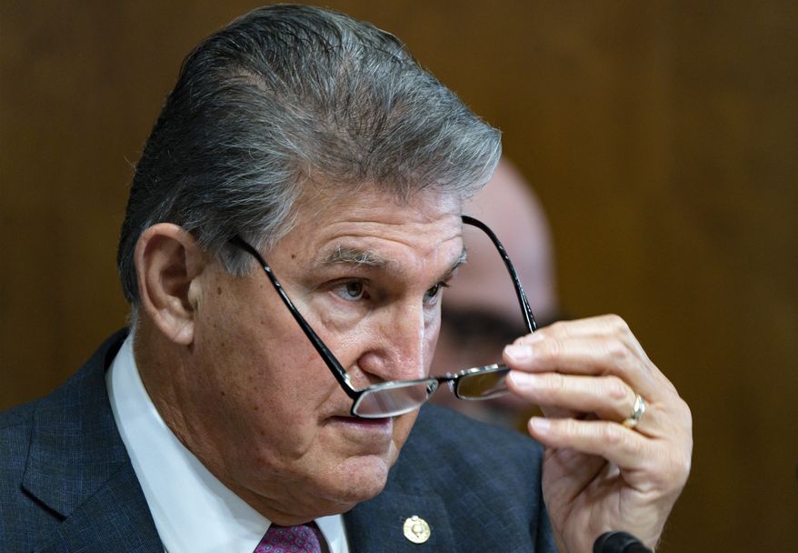 Sen. Joe Manchin, D-W.Va., a key holdout vote on President Joe Biden&#39;s domestic agenda, chairs a hearing of the Senate Energy and Natural Resources Committee, at the Capitol in Washington, Tuesday, Oct. 19, 2021. (AP Photo/J. Scott Applewhite)