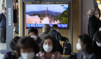 A TV screen showing a news program reporting about North Korea&#39;s missile launch with file footage is seen at a train station in Seoul, South Korea, Tuesday, Oct. 19, 2021. North Korea fired a ballistic missile into the sea on Tuesday in a continuation of its recent weapons tests, the South Korean and Japanese militaries said, hours after the U.S. reaffirmed its offer to resume diplomacy on the North&#39;s nuclear weapons program. A part of Korean letters reads: &quot;Fired a ballistic missile.&quot; (AP Photo/Lee Jin-man)