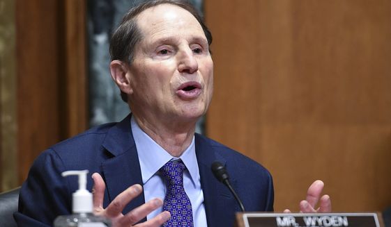 Sen. Ron Wyden, D-Ore., speaks during a Senate Finance Committee hearing on the nomination of Chris Magnus to be the next U.S. Customs and Border Protection commissioner, Tuesday, Oct. 19, 2021 on Capitol Hill in Washington. (Mandel Ngan/Pool via AP)
