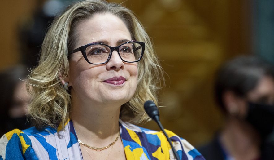 Sen. Kyrsten Sinema, D-Ariz., speaks during a Senate Finance Committee hearing on the nomination of Chris Magnus to be the next U.S. Customs and Border Protection commissioner, Tuesday, Oct. 19, 2021 on Capitol Hill in Washington. (Rod Lamkey/Pool via AP)