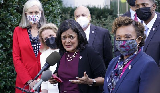 Rep. Pramila Jayapal, D-Wash., the chair of the Congressional Progressive Caucus, center, along with other lawmakers, talks with reporters outside the West Wing of the Washington, Tuesday, Oct. 19, 2021, following their meeting with President Joe Biden. Jayapal is joined by from left, Rep. Katherine Clark, D-Mass., Rep. Debbie Dingell, D-Mich., Rep. Mark Pocan, D-Wis., Rep. Barbara Lee, D-Calif., and Rep. Ritchie Torres, D-New York. (AP Photo/Susan Walsh)