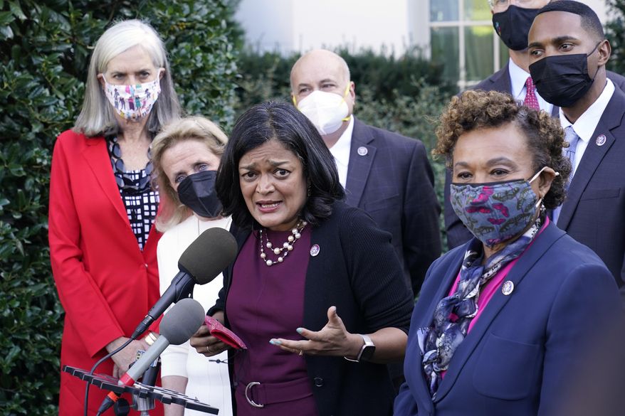 Rep. Pramila Jayapal, D-Wash., the chair of the Congressional Progressive Caucus, center, along with other lawmakers, talks with reporters outside the West Wing of the Washington, Tuesday, Oct. 19, 2021, following their meeting with President Joe Biden. Jayapal is joined by from left, Rep. Katherine Clark, D-Mass., Rep. Debbie Dingell, D-Mich., Rep. Mark Pocan, D-Wis., Rep. Barbara Lee, D-Calif., and Rep. Ritchie Torres, D-New York. (AP Photo/Susan Walsh)