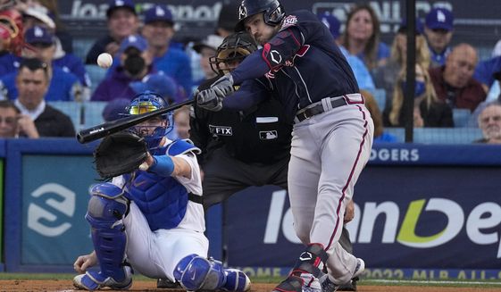 Atlanta Braves&#39; Adam Duvall celebrates his solo home run in the second inning against the Los Angeles Dodgers in Game 4 of baseball&#39;s National League Championship Series Wednesday, Oct. 20, 2021, in Los Angeles. (AP Photo/Marcio Jose Sanchez)