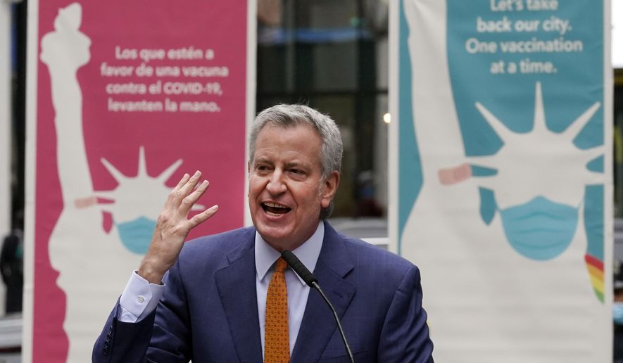 New York Mayor Bill de Blasio delivers his remarks in Times Square after he toured the grand opening of a Broadway COVID-19 vaccination site intended to jump-start the city&#39;s entertainment industry, in New York, in this Monday, April 12, 2021, file photo. (AP Photo/Richard Drew, File)