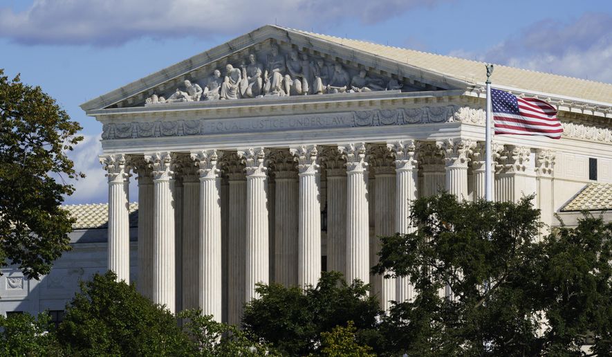 The Supreme Court is seen in Washington, Monday, Oct. 18, 2021. The Biden administration is asking the high court to block the Texas law banning most abortions, while the fight over the measure&#39;s constitutionality plays out in the courts. The law has been in effect since September. (AP Photo/J. Scott Applewhite)