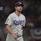 Los Angeles Dodgers starting pitcher Max Scherzer walks off the field after being relieved in the fifth inning in Game 2 of baseball&#39;s National League Championship Series against the Atlanta Braves Sunday, Oct. 17, 2021, in Atlanta. (AP Photo/Brynn Anderson) **FILE**