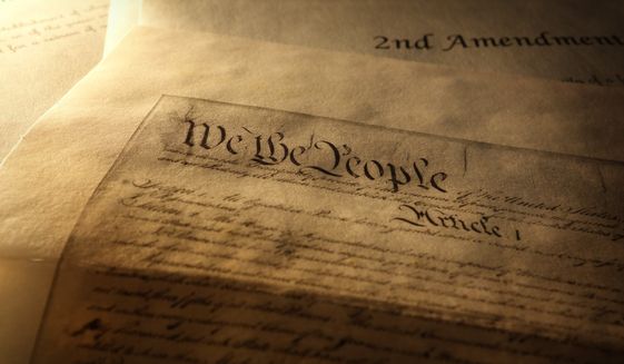Article One of the US Constitution, 2nd amendment and 5th Amendment. Photo credit: zimmytws via Shutterstock. *FILE*