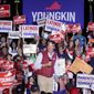 Republican gubernatorial candidate Glenn Youngkin reacts to the crowd during a rally in Glen Allen, Va., Saturday, Oct. 23, 2021. Youngkin will face Democrat Terry McAuliffe in the November election. (AP Photo/Steve Helber)
