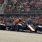 Red Bull driver Max Verstappen, of the Netherlands, steers through a turn during the Formula One U.S. Grand Prix auto race at the Circuit of the Americas, Sunday, Oct. 24, 2021, in Austin, Texas. Verstappen won the race. (AP Photo/Eric Gay) **FILE**