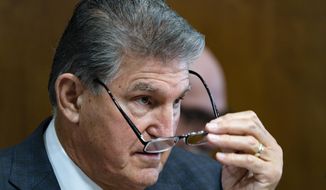 Sen. Joe Manchin, D-W.Va., a key holdout vote on President Joe Biden&#x27;s domestic agenda, chairs a hearing of the Senate Energy and Natural Resources Committee, at the Capitol in Washington, Tuesday, Oct. 19, 2021. (AP Photo/J. Scott Applewhite)