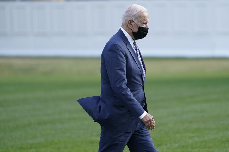 President Joe Biden walks on the South Lawn of the White House in Washington, Monday, Oct. 25, 2021, and heads to the Oval Office after returning from a trip to New Jersey. (AP Photo/Susan Walsh)