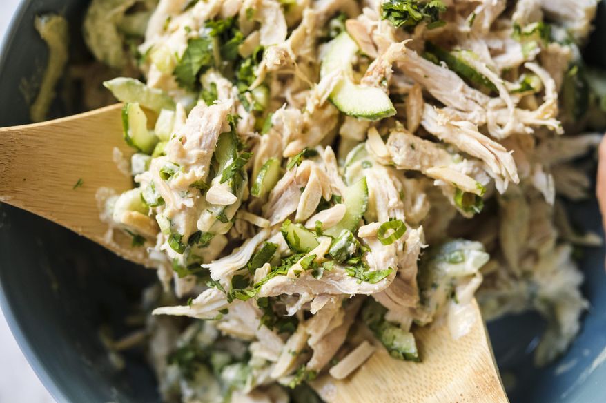 This image released by Milk Street shows a recipe for miso ginger chicken salad. (Milk Street via AP)