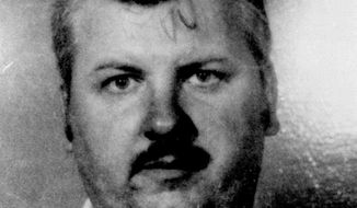 FILE - This 1978 file photo shows serial killer John Wayne Gacy, who was convicted of killing 33 young men and boys in the Chicago area in the 1970s and executed in 1994. More than 40 years after a collection of decaying bodies was found beneath Gacy&#39;s house, authorities announced Monday, Oct. 25, 2021, that they have identified the remains of one more of his victims. (AP Photo, File)