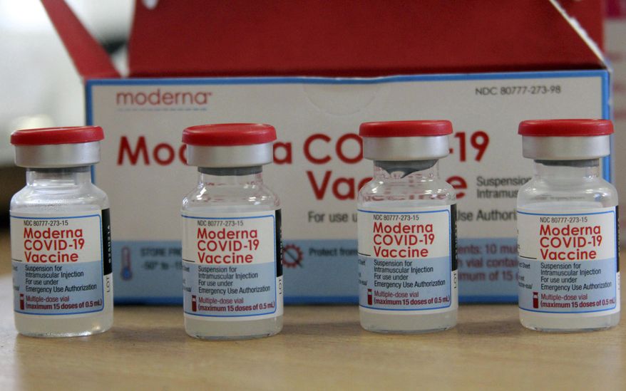 In this Sunday, Aug. 15, 2021 file photo, vials of the Moderna COVID-19 vaccine are seen at the Assad Iben El Fourat school in Oued Ellil, outside Tunisa. The European Medicines Agency said a booster dose of Moderna’s coronavirus vaccine “can be considered” in people aged 18 and above. In a statement on Monday, Oct. 25, the EU drug regulator said its analysis had shown that a third dose given of Moderna’s vaccine - which is usually given in a two-dose schedule - at least six months after the second dose, led to an increase in antibody levels in adults whose levels were waning. (AP Photo/Hassene Dridi, file)FILE