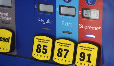 The price is shown on the pump as a motorist fuels a vehicle at an Exxon station Wednesday, Oct. 27, 2021, in Littleton, Colo. (AP Photo/David Zalubowski)