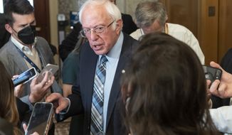 Sen. Bernie Sanders, I-Vt., speaks with reporters, Wednesday, Oct. 27, 2021, on Capitol Hill in Washington. (AP Photo/Jacquelyn Martin)