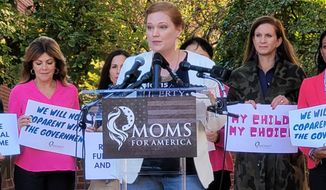 Marie Rogerson, a mother of three, speaks at a protest outside the National School Boards Association headquarters in Alexandria, Virginia, Oct. 21, 2021 (Photo courtesy of Moms for America)