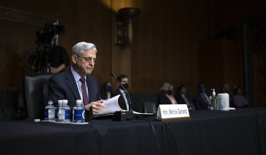 Attorney General Merrick Garland testifies during a Senate Judiciary Committee hearing examining the Department of Justice on Capitol Hill in Washington, Wednesday, Oct. 27, 2021. (Tom Brenner/Pool via AP)