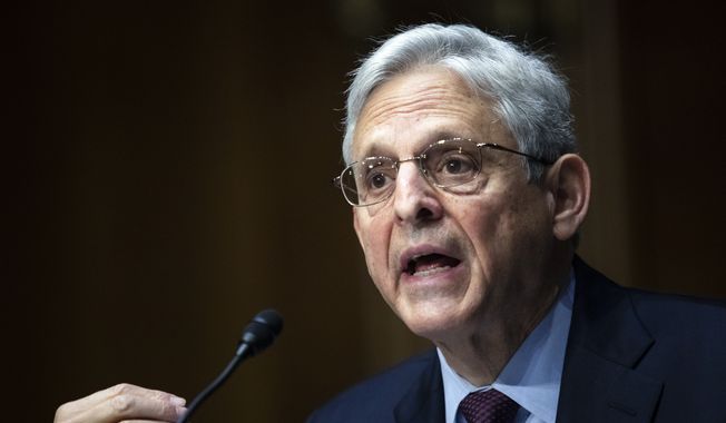 Attorney General Merrick Garland testifies during a Senate Judiciary Committee hearing examining the Department of Justice on Capitol Hill in Washington, Wednesday, Oct. 27, 2021. (Tom Brenner/Pool via AP)