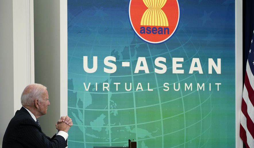 In this file photo, President Joe Biden participates virtually in the U.S.-ASEAN Summit from the South Court Auditorium on the White House complex in Washington, Tuesday, Oct. 26, 2021. 
Mr. Biden will host leaders of the Association of Southeast Asian Nations (ASEAN) for a summit in Washington next month, the White House announced on Saturday. (AP Photo/Susan Walsh)   **FILE**